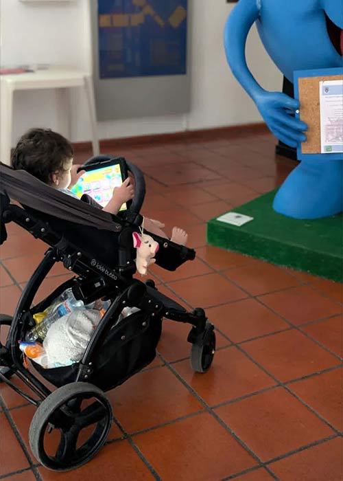 The tablet to keep him happy out after swimming in Portugal. Pic: Supplied