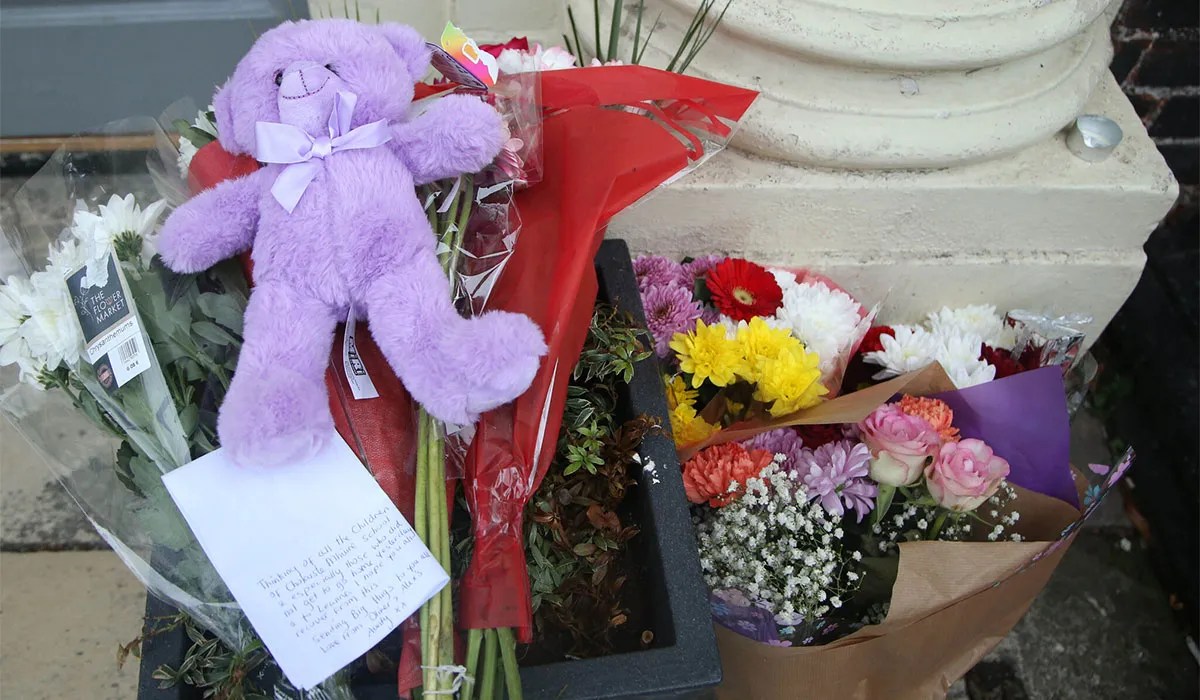 Flowers and tributes placed at the entrance to Gaelscoil Cholaiste Mhuire on Parnell Square East. Pic: Stephen Collins/Collins Photos