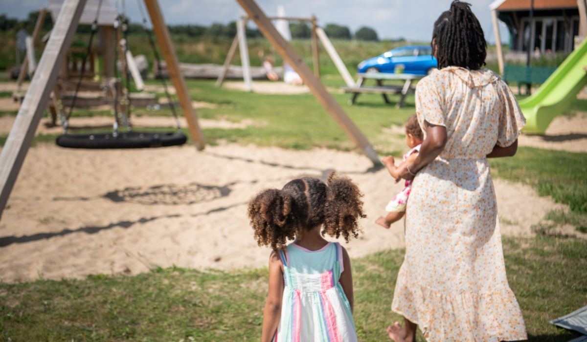 Mother and children at playground