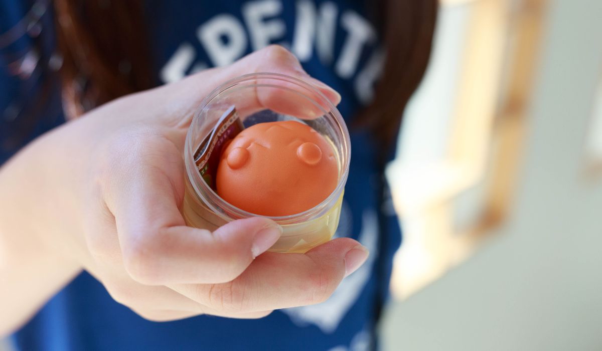 Child holding squishy toy