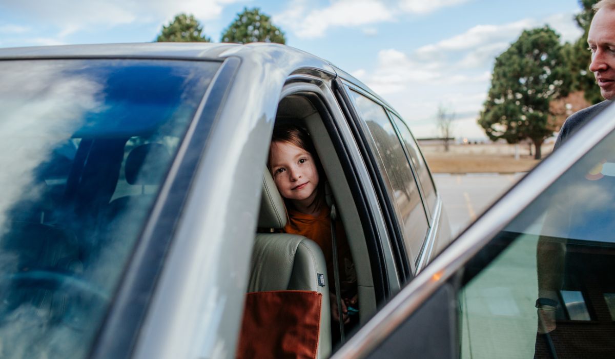 At what age can children sit in the front seat of the car