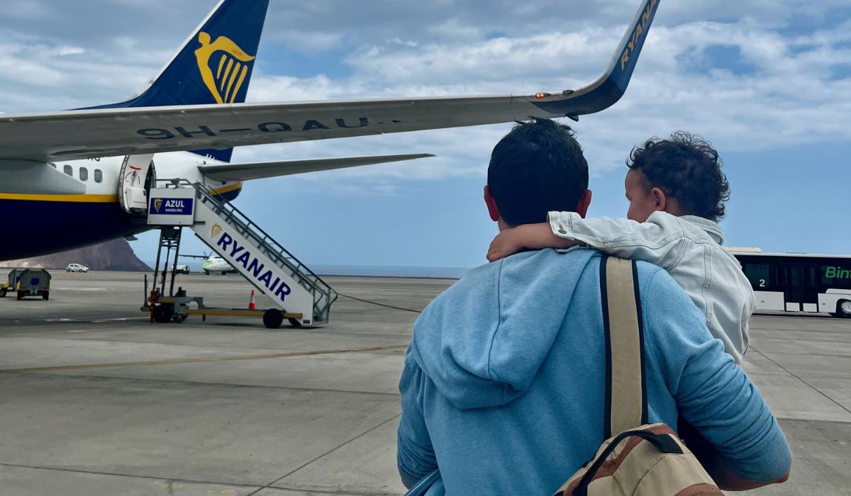 Parent and child at airplane