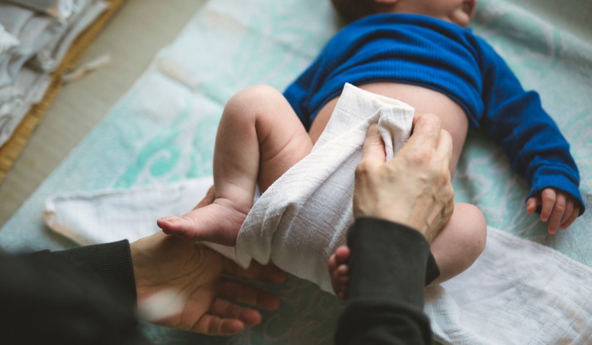 Baby wearing cloth nappy