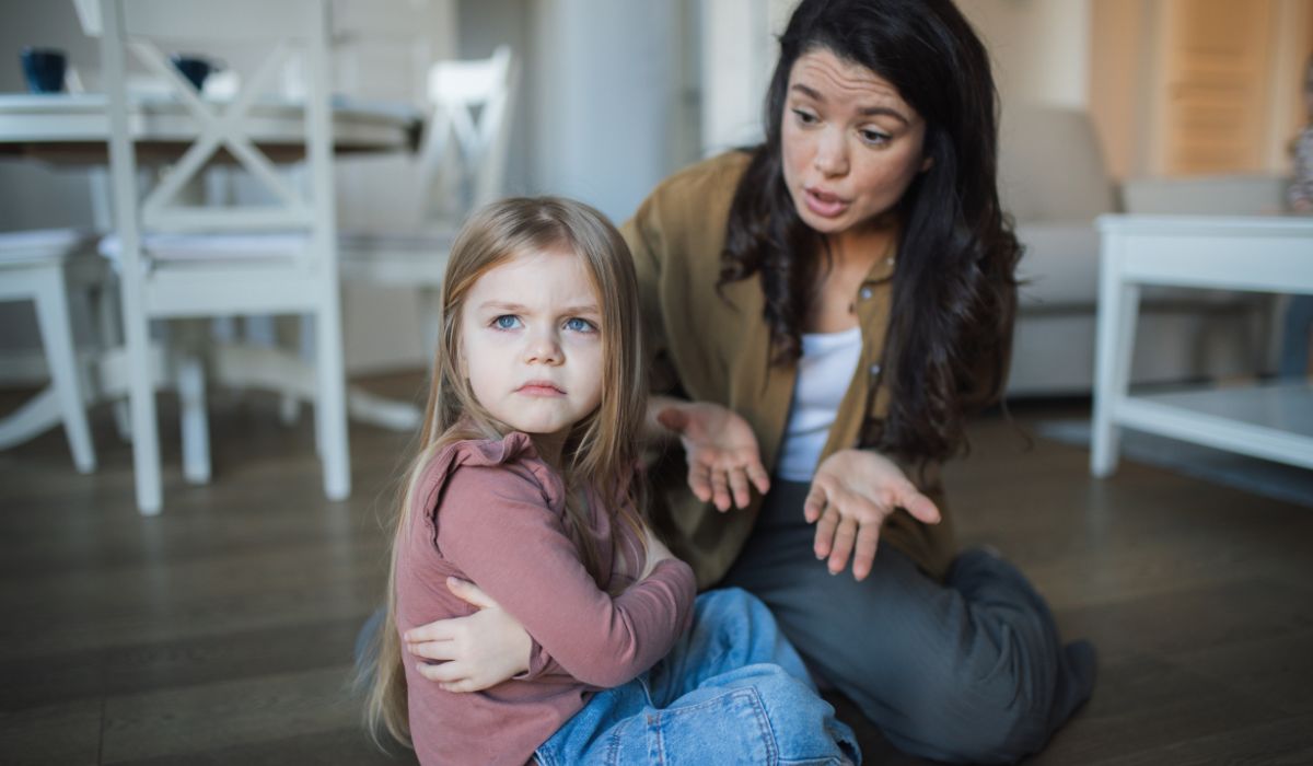 Mother scolding child